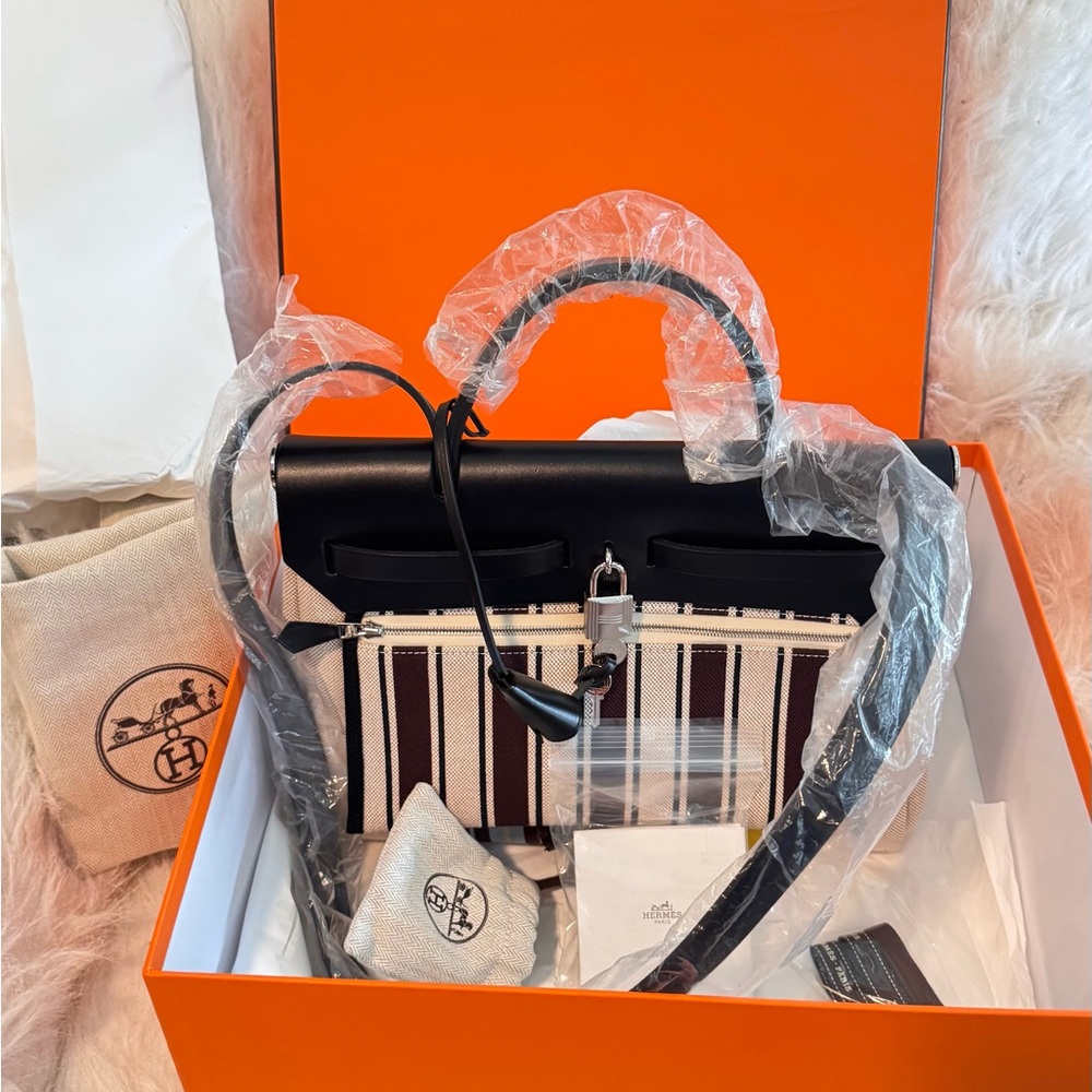 Hermes Herbag Zip 31 laquered bag Black and White Satchel with Classic Design